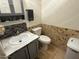 Updated bathroom with gray vanity and tile flooring at 5249 E Hobart St, Mesa, AZ 85205