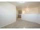 Open landing area on second floor featuring gray cabinets and access to other rooms at 5249 E Hobart St, Mesa, AZ 85205