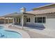 The spacious covered patio is perfect for relaxing by the pool at 5249 E Hobart St, Mesa, AZ 85205