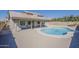 Inviting backyard pool with an expansive patio, perfect for outdoor entertaining and relaxation at 5249 E Hobart St, Mesa, AZ 85205