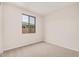 Bedroom with a window and neutral walls at 17842 W Blue Sky Dr, Surprise, AZ 85387