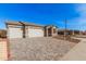 New construction home with two-car garage and paver driveway at 17842 W Blue Sky Dr, Surprise, AZ 85387