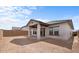 Backyard features a covered patio and lots of space at 7620 W Minton St, Laveen, AZ 85339