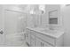 Bathroom features a glass shower, double sinks, and white marble at 7620 W Minton St, Laveen, AZ 85339