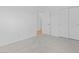 Bedroom with soft carpet, double closets, and a view into the hallway at 7620 W Minton St, Laveen, AZ 85339