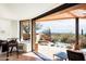 Seamless indoor/outdoor living with a covered patio, pool, and desert landscape, perfect for entertaining at 42035 N 113Th Way, Scottsdale, AZ 85262