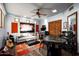 Spacious recreation room with a ceiling fan, ample lighting, and versatile space for entertainment at 42035 N 113Th Way, Scottsdale, AZ 85262