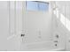 Bright bathroom with a shower/tub combo and a window at 691 E Elgin St, Gilbert, AZ 85295