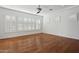 Bedroom with hardwood floors and plantation shutters at 691 E Elgin St, Gilbert, AZ 85295