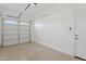 Garage with automatic door opener and extra storage at 691 E Elgin St, Gilbert, AZ 85295