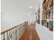 Spacious hallway with hardwood floors and built-in shelves at 691 E Elgin St, Gilbert, AZ 85295