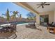 Covered patio with seating area and pool view at 691 E Elgin St, Gilbert, AZ 85295