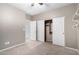 Bedroom featuring sliding closet doors and shelving unit at 2140 W Clearview Trl, Anthem, AZ 85086