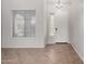 Bright foyer featuring neutral paint, tile flooring, and a front door with sidelight windows at 2140 W Clearview Trl, Anthem, AZ 85086