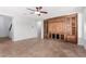 Inviting living room featuring custom built-ins, neutral paint, and a ceiling fan at 2140 W Clearview Trl, Anthem, AZ 85086