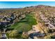 Aerial view of a golf course community with upscale homes at 40903 N Harbour Town Way, Anthem, AZ 85086