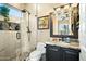 Bathroom with walk-in shower, pebble floor, and vanity at 40903 N Harbour Town Way, Anthem, AZ 85086