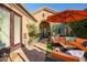 Inviting courtyard with seating area, fountain, and cacti at 40903 N Harbour Town Way, Anthem, AZ 85086