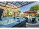 Relaxing hot tub with pergola and stunning views at 40903 N Harbour Town Way, Anthem, AZ 85086