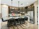 Modern kitchen with stainless steel appliances and a large island at 40903 N Harbour Town Way, Anthem, AZ 85086