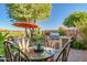 Outdoor dining area with built-in grill and seating at 40903 N Harbour Town Way, Anthem, AZ 85086