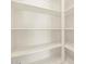 Bright walk-in pantry with ample shelving at 22556 W Tonopah Dr, Surprise, AZ 85387