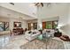Bright and airy living room with vaulted ceilings, large windows, and an open floor plan at 2744 S First Water Ln, Gold Canyon, AZ 85118