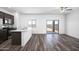 Bright living area with access to the kitchen and outdoor patio at 24579 W St Catherine Ave, Buckeye, AZ 85326