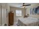 Comfortable bedroom with a ceiling fan and window blinds at 29205 N Yellow Bee Dr, San Tan Valley, AZ 85143