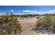 Partial view of a golf course from a residential property at 29205 N Yellow Bee Dr, San Tan Valley, AZ 85143