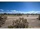 Partial view of a golf course from a residential property at 29205 N Yellow Bee Dr, San Tan Valley, AZ 85143