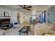 Open living room featuring a view of the kitchen and dining area at 29205 N Yellow Bee Dr, San Tan Valley, AZ 85143