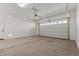 Spacious two car garage with automatic door and access to inside of home at 11937 W Parkway Ln, Avondale, AZ 85323