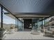 Stunning outdoor patio with modern pergola, fire pit, and panoramic mountain views at 4301 E Upper Ridge Way, Paradise Valley, AZ 85253