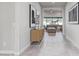 Entryway of home with tile floors and view into the living room with neutral color scheme at 21864 E Sunset Dr, Queen Creek, AZ 85142