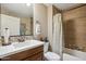 A fully equipped bathroom featuring mosaic tile accents, modern fixtures, and a shower at 2425 W Bronco Butte Trl # 1002, Phoenix, AZ 85085