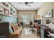 Functional home office with ample desk space, comfortable seating, and natural light from the window at 2425 W Bronco Butte Trl # 1002, Phoenix, AZ 85085