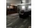 Comfortable living room features a ceiling fan, a large media center and plenty of seating at 42355 W Somerset Dr, Maricopa, AZ 85138