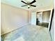 Bedroom with neutral carpet, fan, and neutral color scheme at 23200 W Ashleigh Marie Dr, Buckeye, AZ 85326