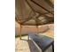 Gazebo in backyard with dark table and built-in fire pit at 23200 W Ashleigh Marie Dr, Buckeye, AZ 85326
