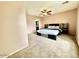 Spacious main bedroom featuring a ceiling fan and neutral walls at 23200 W Ashleigh Marie Dr, Buckeye, AZ 85326