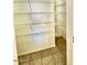 Pantry closet with white wire shelving and tile floor at 23200 W Ashleigh Marie Dr, Buckeye, AZ 85326