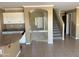 Open-concept layout connecting kitchen, dining area, and staircase to the upper level at 29101 N Yellow Bee Dr, San Tan Valley, AZ 85143