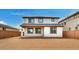 Two story backyard featuring a neutral color palette and lots of natural light at 10864 E Texas Ave, Mesa, AZ 85212