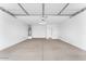 Clean and spacious garage with ample storage and high ceilings at 10864 E Texas Ave, Mesa, AZ 85212