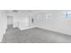 Upstairs hallway featuring neutral carpet, white walls, and several windows allowing natural light at 10864 E Texas Ave, Mesa, AZ 85212