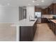 Gourmet kitchen with a large island, stainless steel appliances, and recessed lighting at 7691 W Cactus Wren Way, Florence, AZ 85132