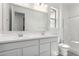 Well-lit bathroom showcasing double sinks, vanity, and shower at 12333 W Marguerite Ave, Avondale, AZ 85323