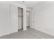 View of bedroom with neutral carpet, paint and large closet at 12333 W Marguerite Ave, Avondale, AZ 85323
