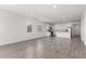 Bright living space featuring tiled floors and large windows that provide plenty of natural light at 12333 W Marguerite Ave, Avondale, AZ 85323